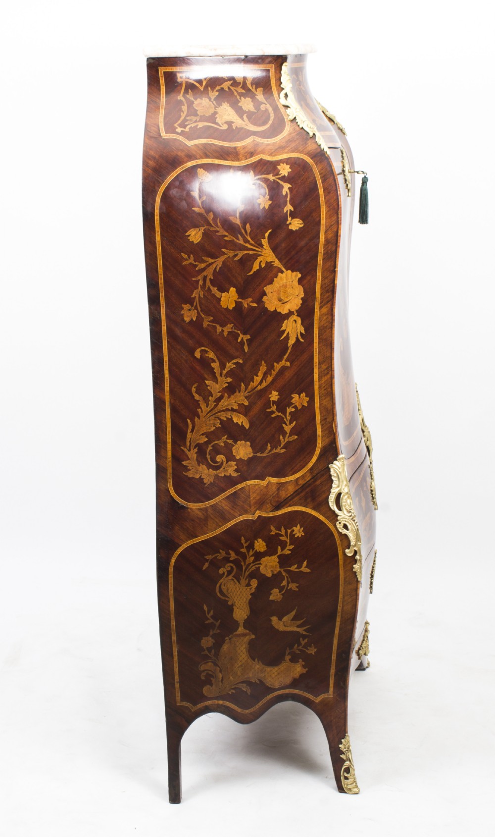 A 19th-century French Rococo Revival secretaire a abattant crafted with floral marquetry, gilt bronze mounts, a contoured silhouette, and a marble top. View XXIV