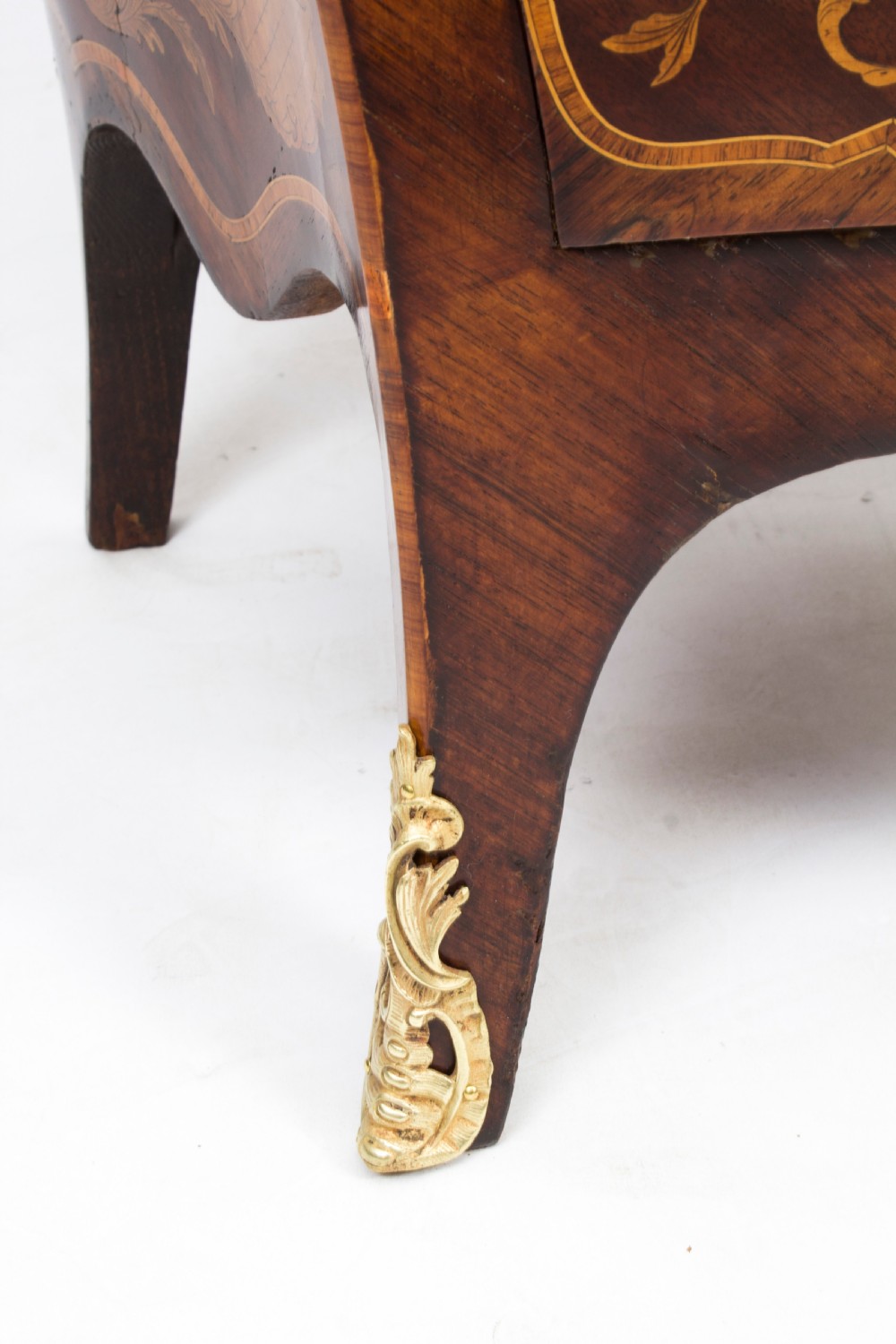 A 19th-century French Rococo Revival secretaire a abattant crafted with floral marquetry, gilt bronze mounts, a contoured silhouette, and a marble top. View XXIX