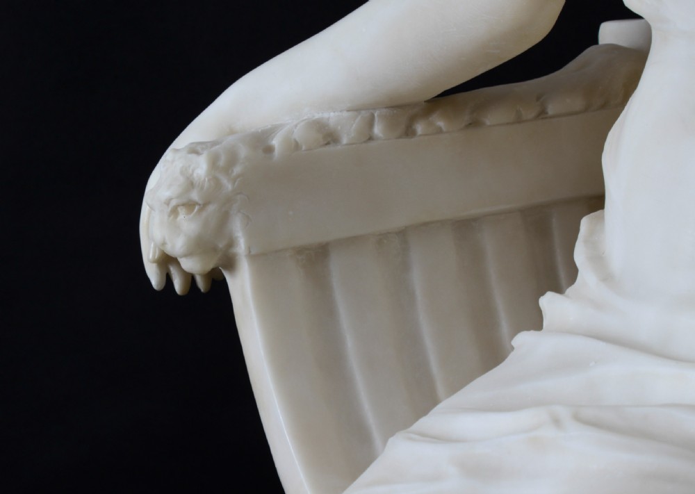A 19th-century white carved alabaster sculpture depicting a seated female figure in drapery with a male figure standing behind her. View XI