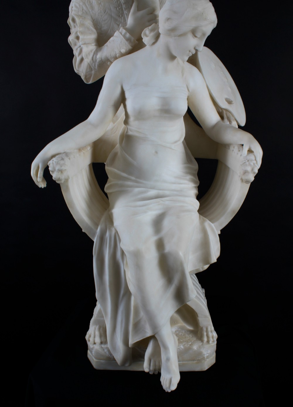 A 19th-century white carved alabaster sculpture depicting a seated female figure in drapery with a male figure standing behind her. View XIX