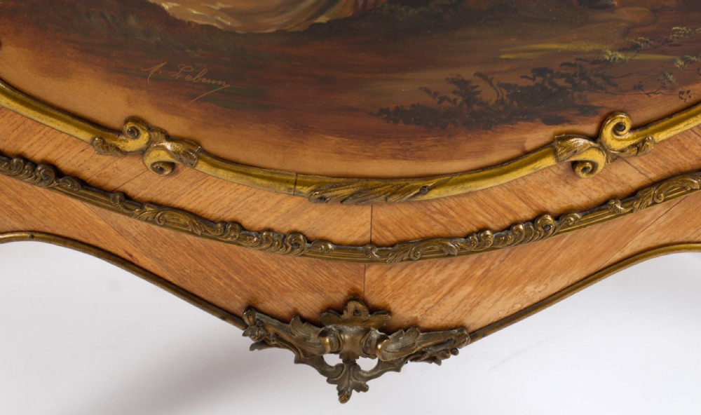 A nineteenth-century French Louis XV style bombee vitrine cabinet featuring curved glass panels, hand-painted Vernis Martin lower sections, and ornate gilt bronze mounts. View XXVI