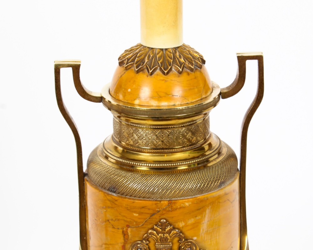 A pair of 19th-century French urn-form Siena marble table lamps featuring detailed gilt bronze mounts and handles. View XII