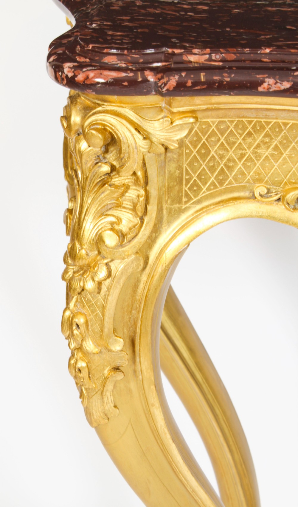 A 19th-century Louis Revival carved giltwood console table with cabriole legs and a dark red marble top. View XIII