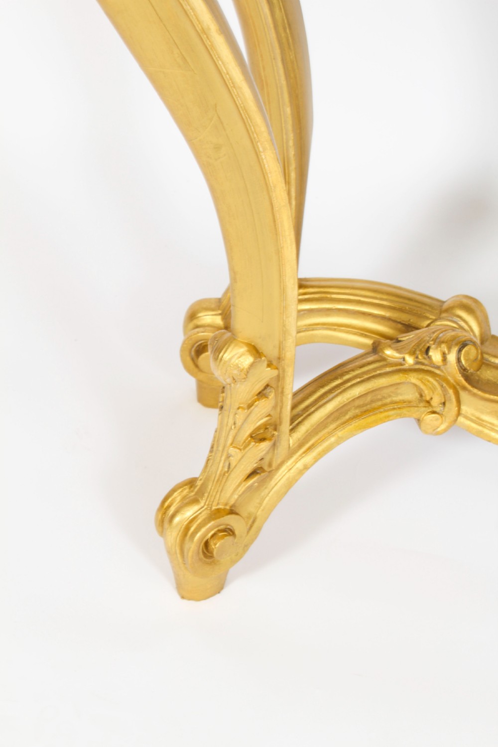 A 19th-century Louis Revival carved giltwood console table with cabriole legs and a dark red marble top. View XV