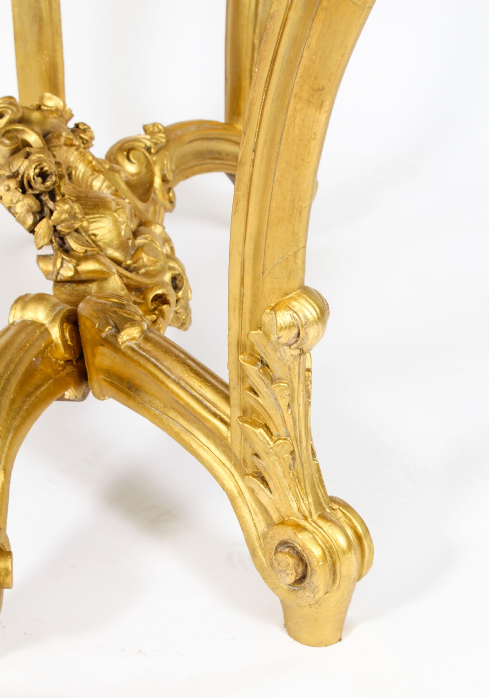 A 19th-century Louis Revival carved giltwood console table with cabriole legs and a dark red marble top. View XVIII