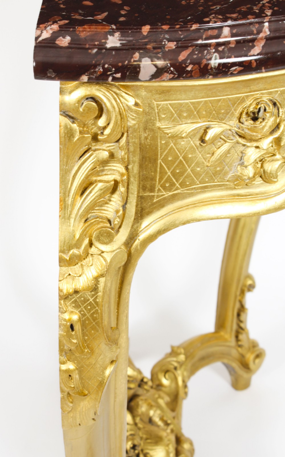 A 19th-century Louis Revival carved giltwood console table with cabriole legs and a dark red marble top. View XX
