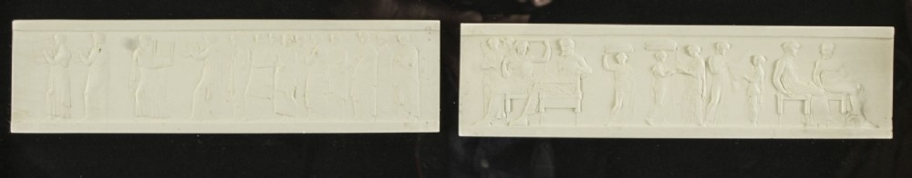 A set of three gilt-framed box displays housing white plaster Grand Tour intaglios mounted on dark backings. View XVI