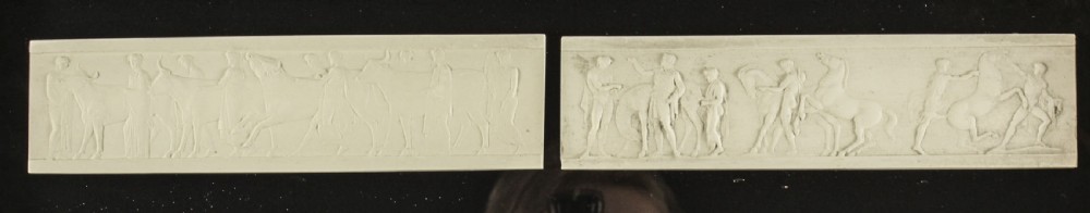 A set of three gilt-framed box displays housing white plaster Grand Tour intaglios mounted on dark backings. View XXIV