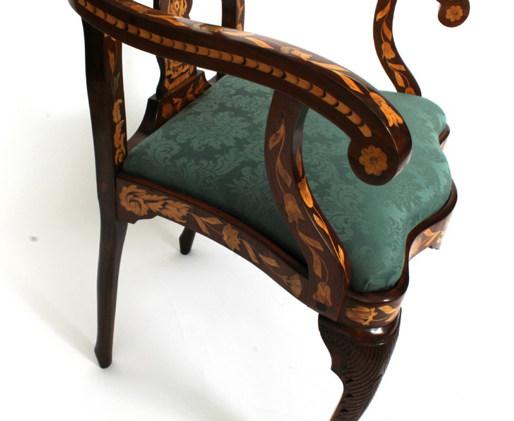 A pair of late eighteenth-century Dutch walnut high back armchairs featuring detailed floral marquetry inlay throughout and green damask drop-in seats. View VIII