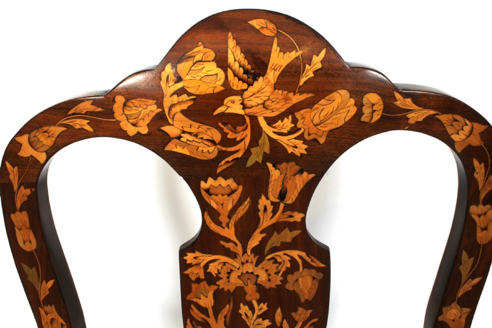 A pair of late eighteenth-century Dutch walnut high back armchairs featuring detailed floral marquetry inlay throughout and green damask drop-in seats. View XI