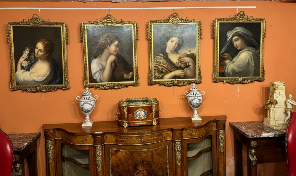 A set of four 19th-century oil paintings on canvas depicting allegorical female portraits of the Four Seasons inside ornate gold carved frames. View II
