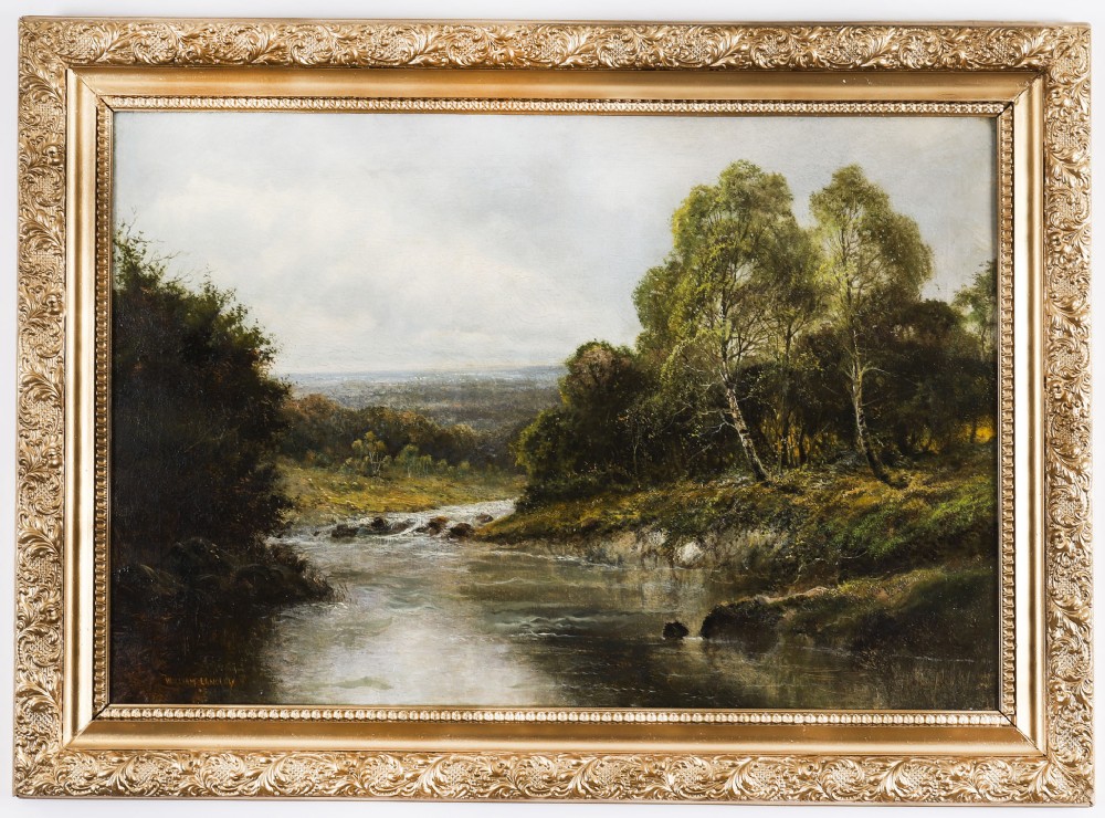 An oil painting depicting a calm Welsh river flowing through wooded countryside framed in an ornate gilded frame.