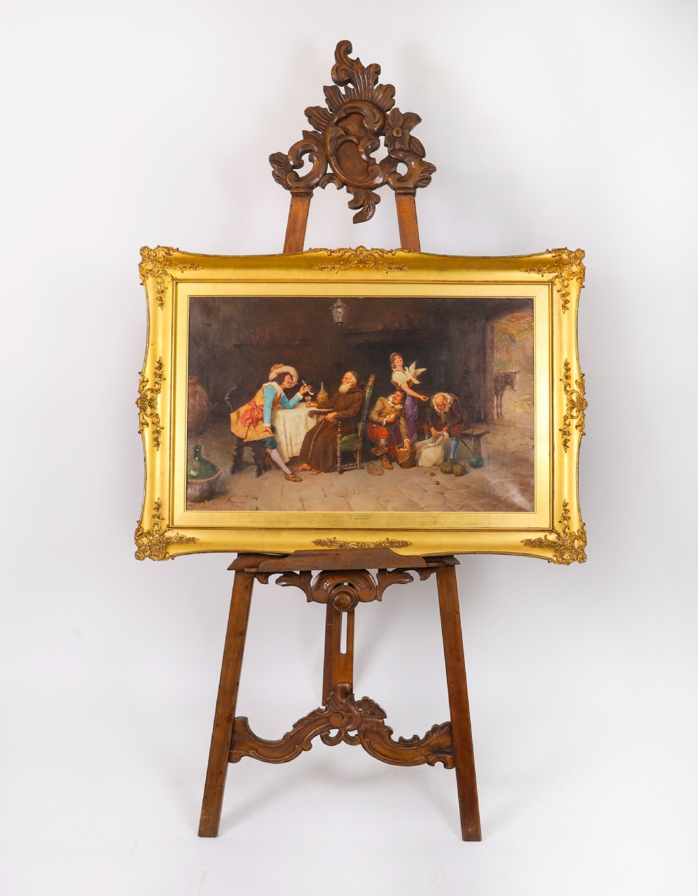 An antique carved walnut artist easel featuring an ornate Rococo cresting, an adjustable shelf, and scrolled leg supports. View III