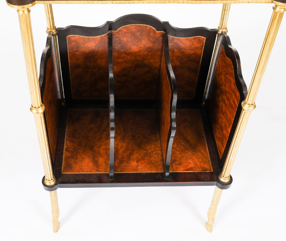 A pair of 19th-century French occasional side tables featuring marquetry tops with brass gallery rails, lower partitioned racks, and gilt metal legs. View XIII