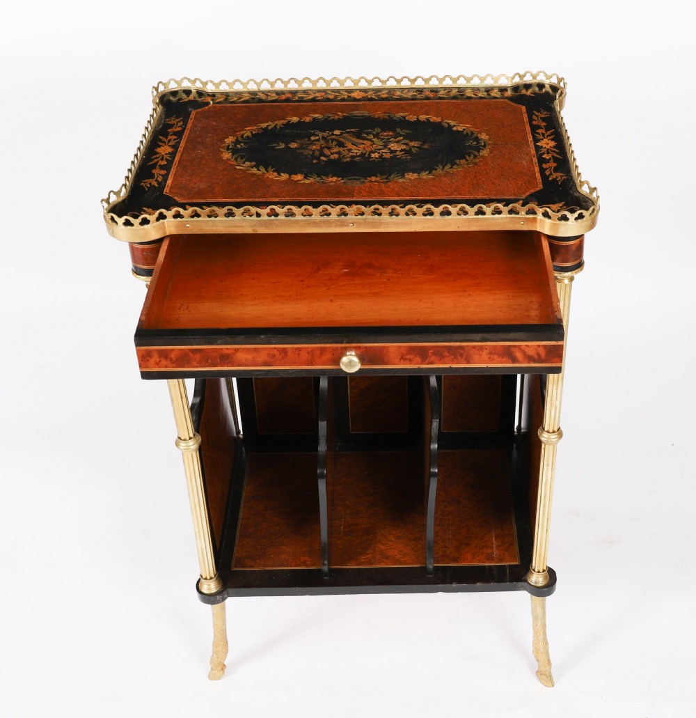 A pair of 19th-century French occasional side tables featuring marquetry tops with brass gallery rails, lower partitioned racks, and gilt metal legs. View XIV