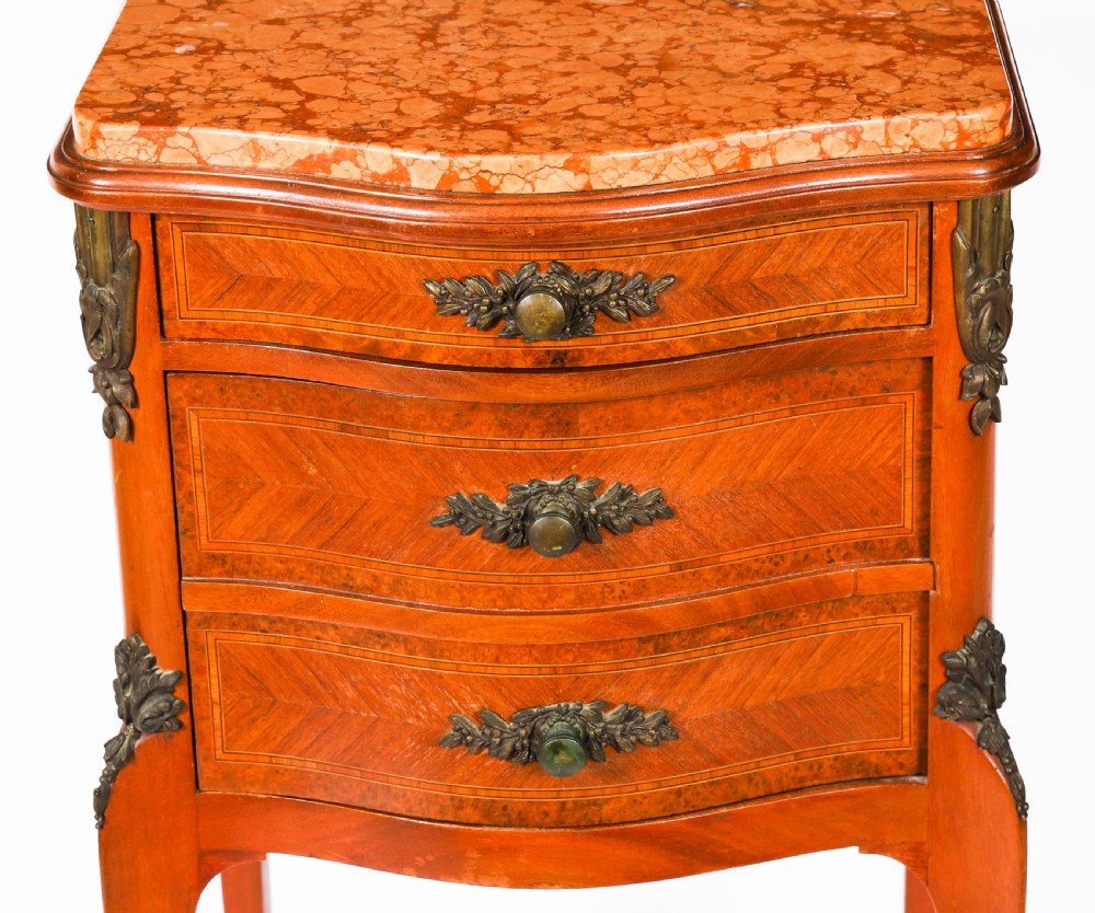 A pair of 19th-century French Louis XV style parquetry bedside cabinets featuring marble tops, three drawers, and cabriole legs with bronze mounts. View VI