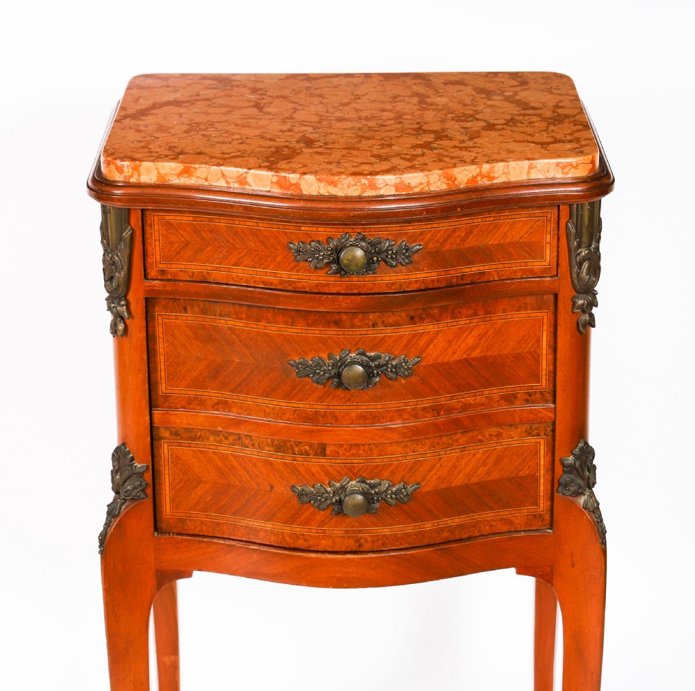A pair of 19th-century French Louis XV style parquetry bedside cabinets featuring marble tops, three drawers, and cabriole legs with bronze mounts. View XI
