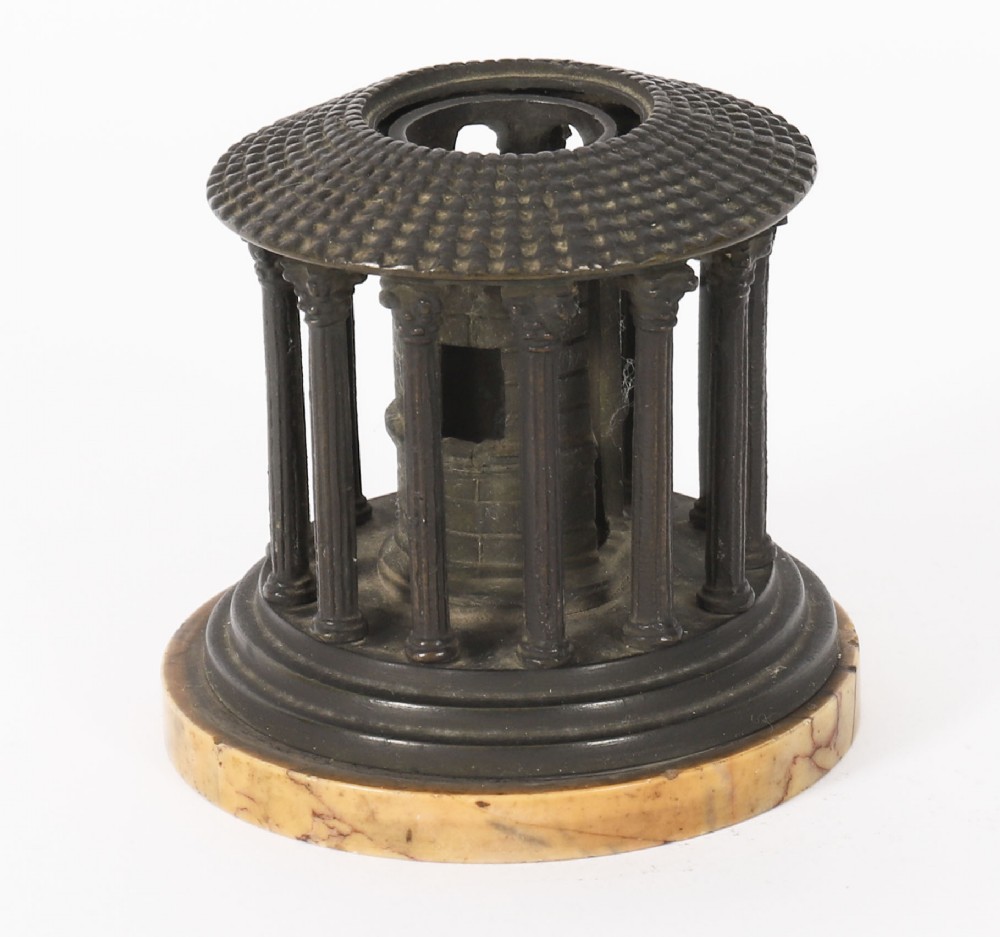 A nineteenth-century dark bronze architectural model of the circular Temple of Hercules Victor featuring Corinthian columns and a tiled roof mounted on a marble base.