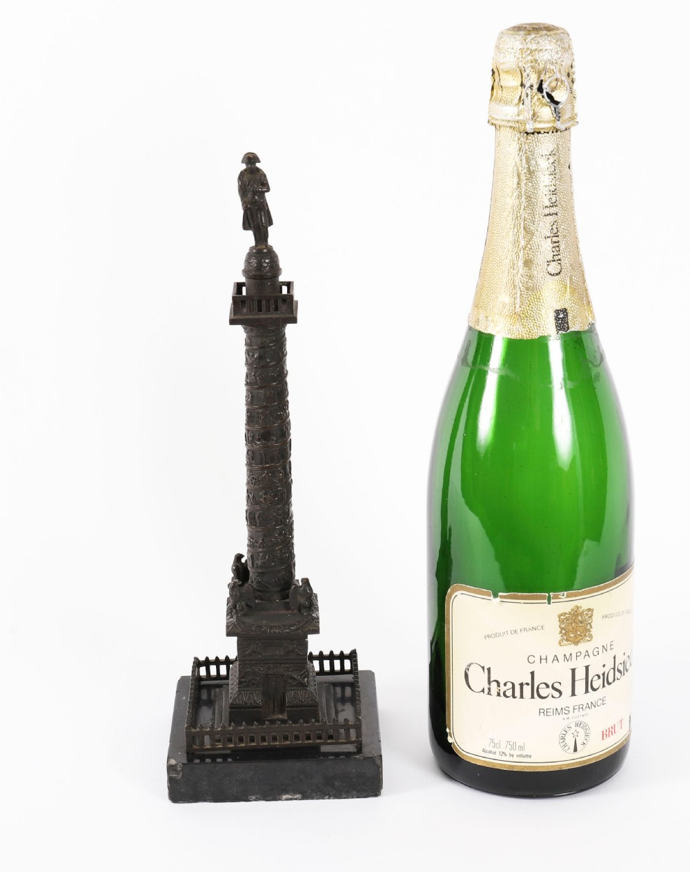 A 19th-century dark bronze miniature of the Vendome Column featuring a statue atop a spiral relief shaft on a square black marble base. View XIII