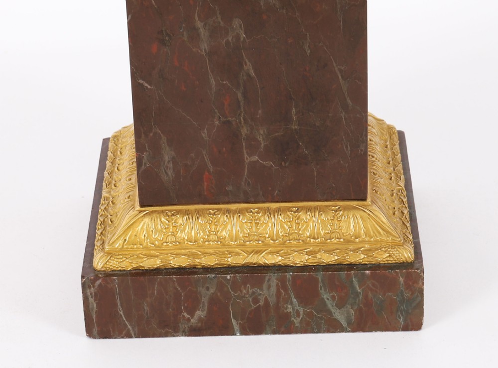 A pair of nineteenth-century French ormolu and bronze tazzas with scroll handles, mounted on tall rectangular red marble plinths. View XIV