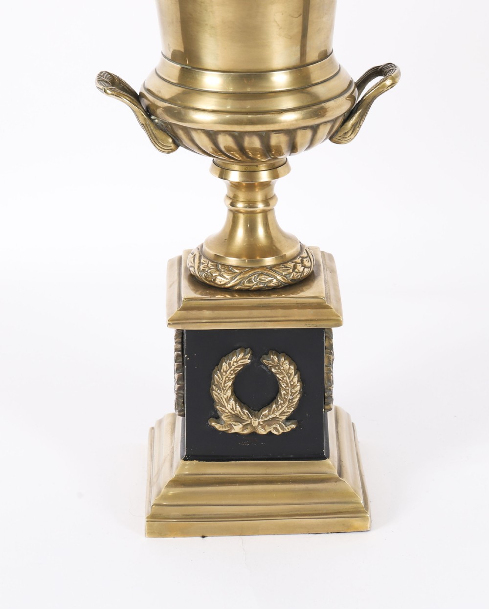 A pair of 19th-century Neoclassical brass Grand Tour campana urns mounted on square black plinths with gilded laurel wreath embellishments. View XIII