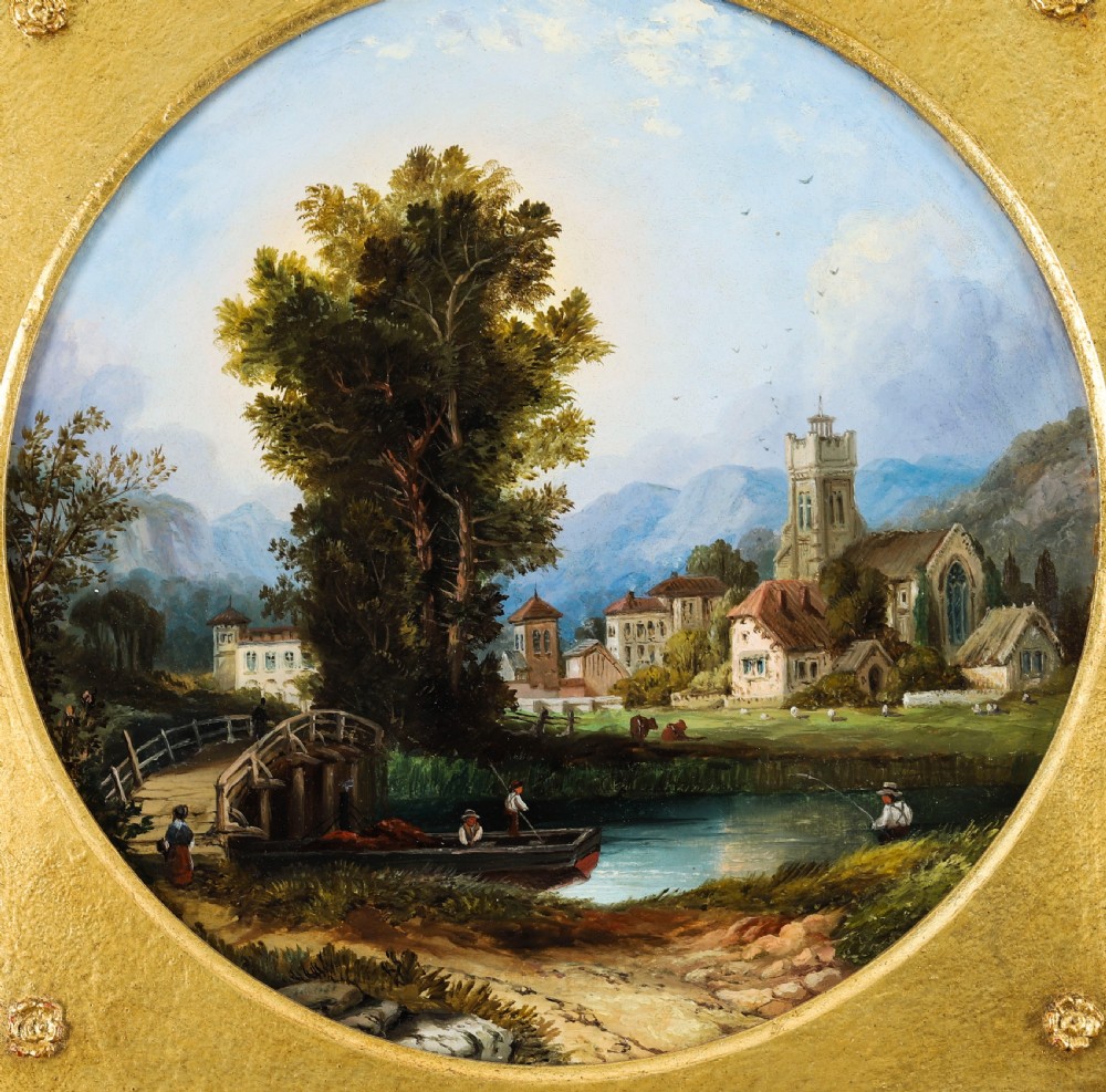 A pair of nineteenth-century oil paintings on board depicting river scenes with figures and ruins, housed in square gilded frames with circular tondo apertures. View V