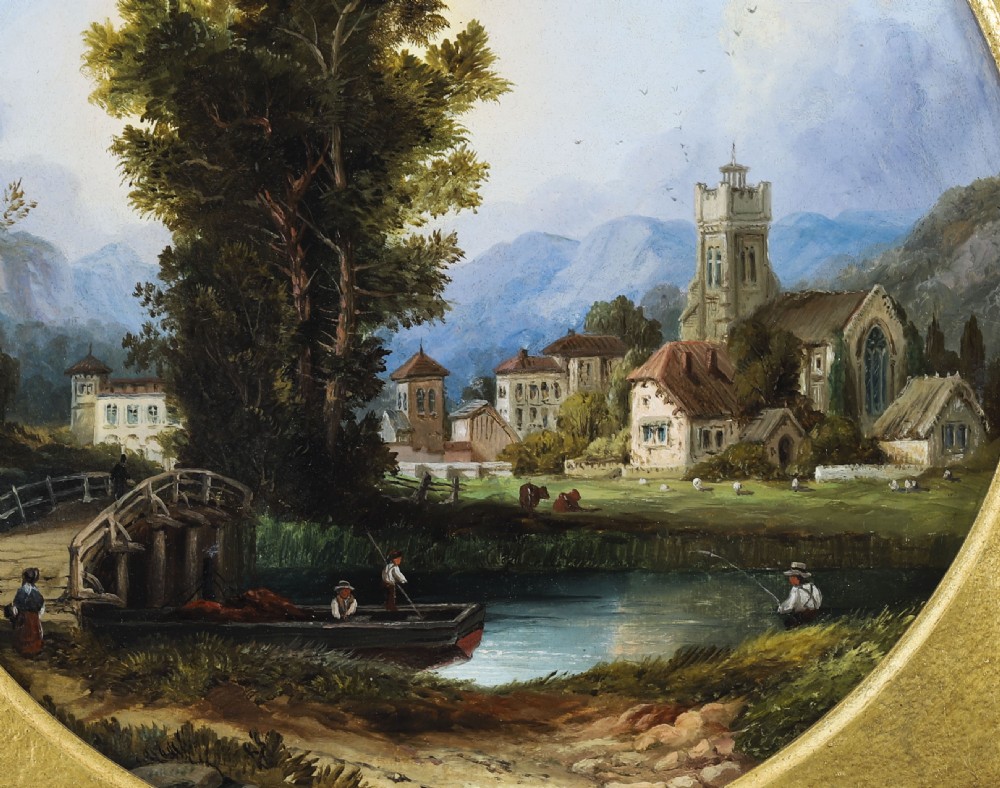 A pair of nineteenth-century oil paintings on board depicting river scenes with figures and ruins, housed in square gilded frames with circular tondo apertures. View VI