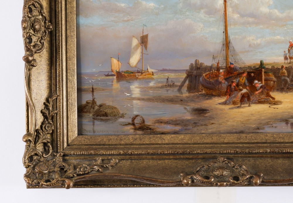 A pair of early 20th-century Dutch maritime oil paintings depicting fishing vessels and figures on a beach, framed in ornate giltwood frames. View VI