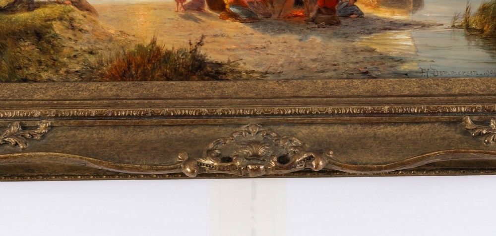 A pair of early 20th-century Dutch maritime oil paintings depicting fishing vessels and figures on a beach, framed in ornate giltwood frames. View XI