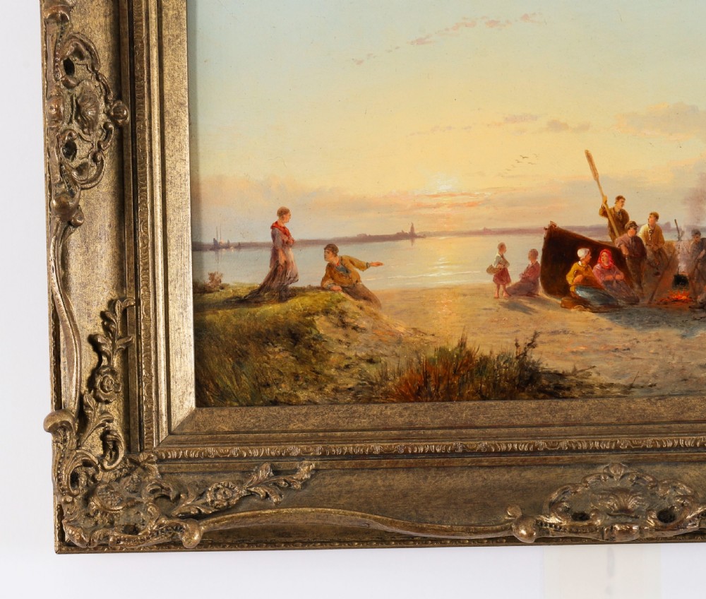 A pair of early 20th-century Dutch maritime oil paintings depicting fishing vessels and figures on a beach, framed in ornate giltwood frames. View XII