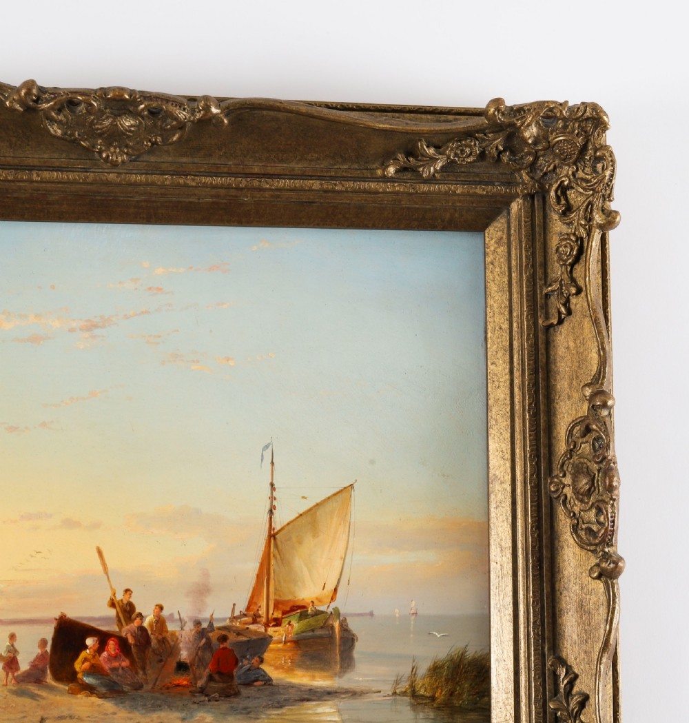 A pair of early 20th-century Dutch maritime oil paintings depicting fishing vessels and figures on a beach, framed in ornate giltwood frames. View XIII
