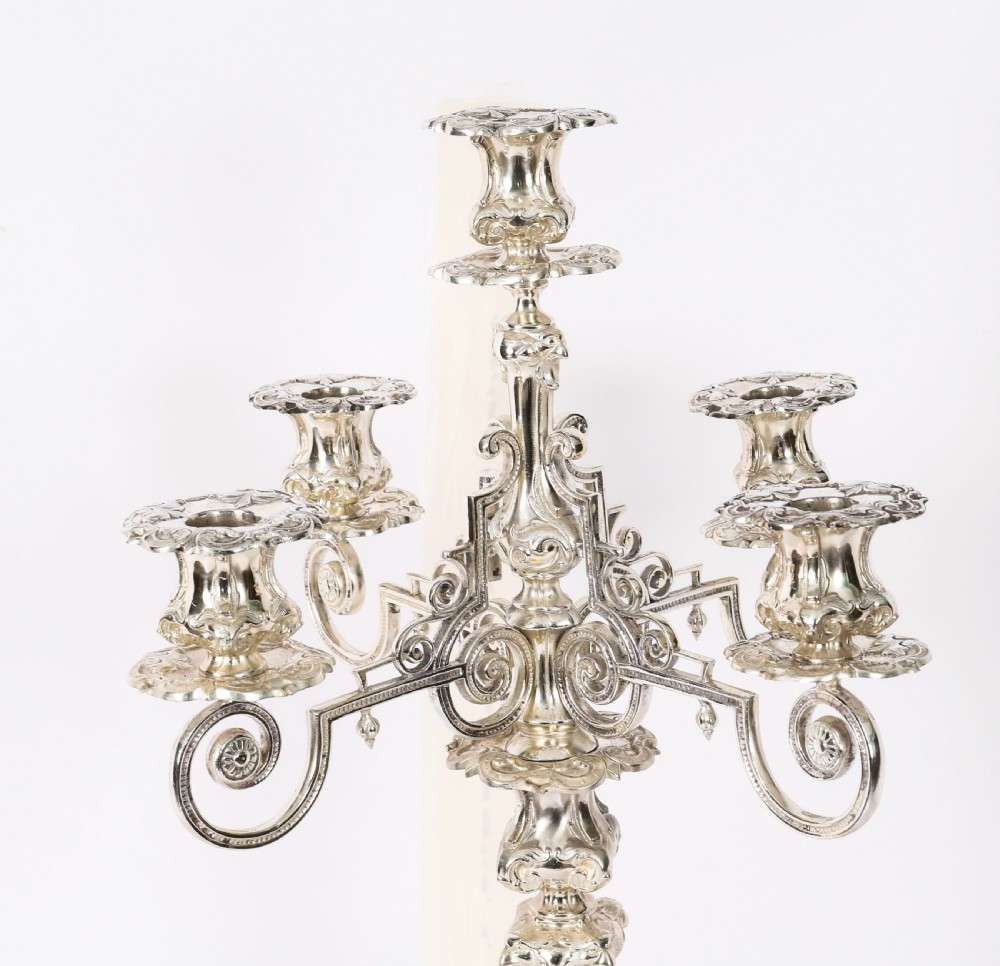 An ornate 19th-century Swedish five-light silver-plated candelabra featuring elaborate scrolling arms and a decorated shaped base. View III