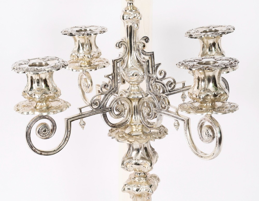 An ornate 19th-century Swedish five-light silver-plated candelabra featuring elaborate scrolling arms and a decorated shaped base. View IV