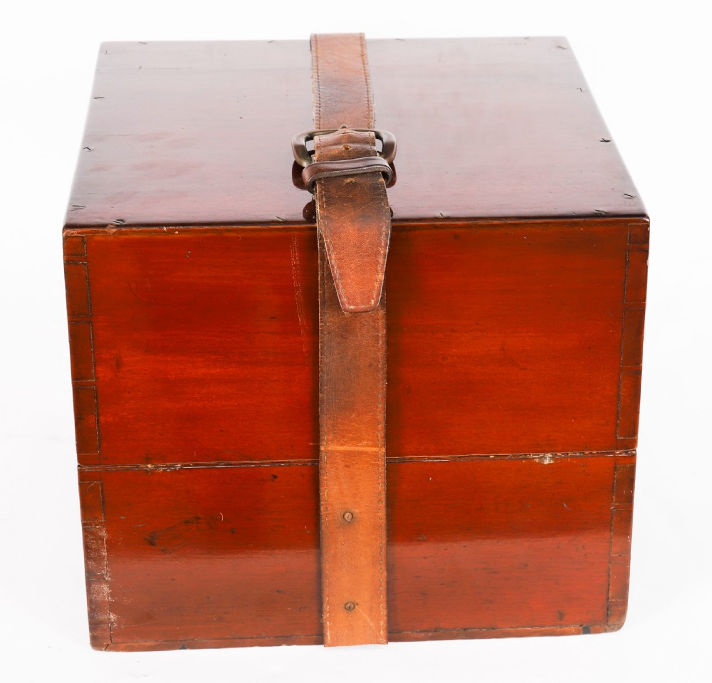 An open mahogany transit box displaying a 19th-century Paget star celestial globe with calibrated brass rings set over green felt lining. View XIV
