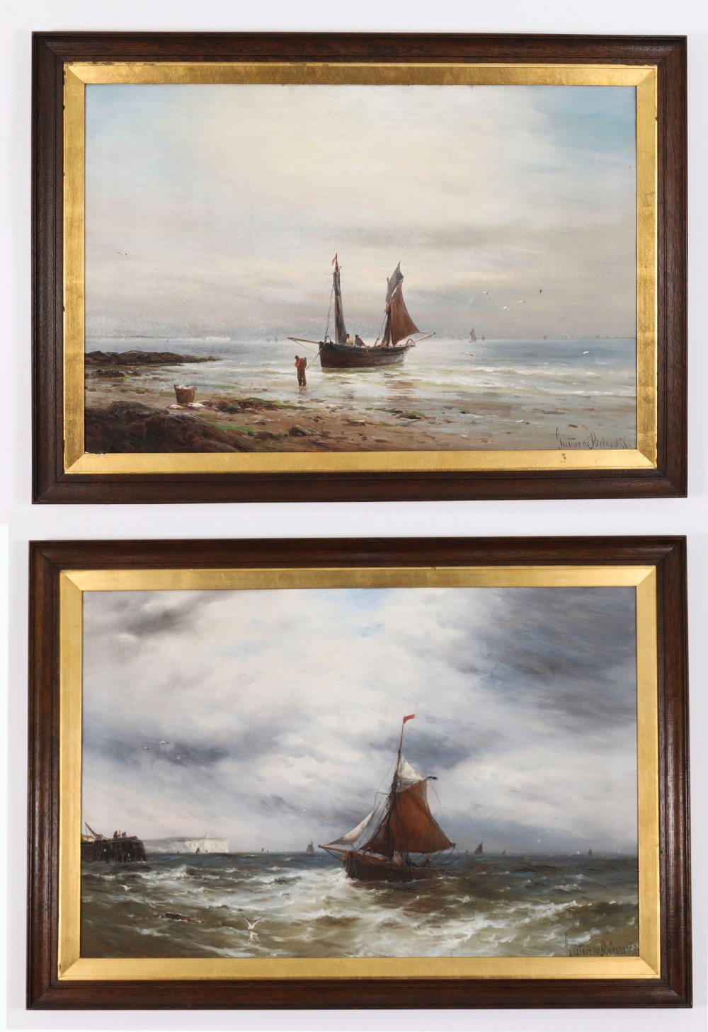 A pair of framed 19th-century oil on canvas paintings depicting coastal seascapes with wooden fishing vessels, encased in dark wood frames with gilded inner slips.