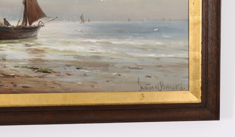 A pair of framed 19th-century oil on canvas paintings depicting coastal seascapes with wooden fishing vessels, encased in dark wood frames with gilded inner slips. View XVII