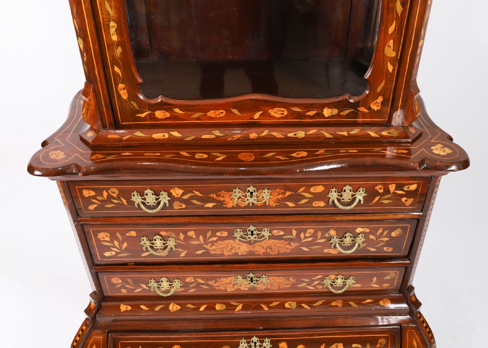 An 18th-century Dutch walnut cabinet on chest featuring detailed floral marquetry inlay, an arched bonnet top with glass doors, and four brass-handled drawers. View VIII