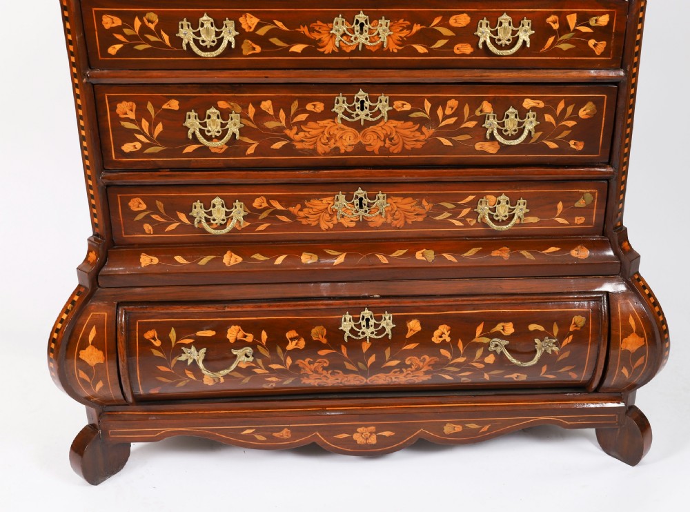 An 18th-century Dutch walnut cabinet on chest featuring detailed floral marquetry inlay, an arched bonnet top with glass doors, and four brass-handled drawers. View XI
