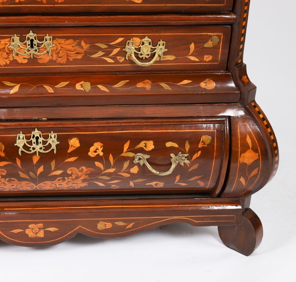 An 18th-century Dutch walnut cabinet on chest featuring detailed floral marquetry inlay, an arched bonnet top with glass doors, and four brass-handled drawers. View XIV