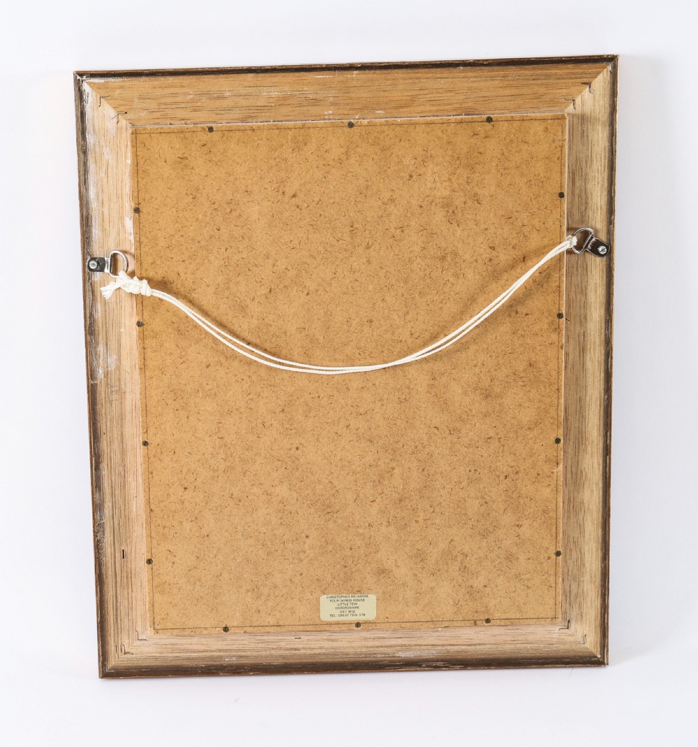 A pair of gold giltwood frames displaying classical white plaster intaglio casts arranged symmetrically against a dark background. View XI
