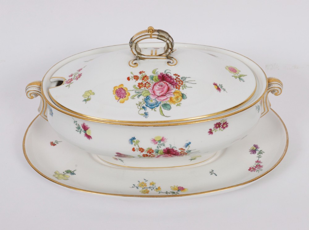 A 60-piece Victorian Copeland Spode white porcelain dinner service decorated with hand-painted floral bouquets, gilt rims, plates, crescent side dishes, and a covered tureen. View II