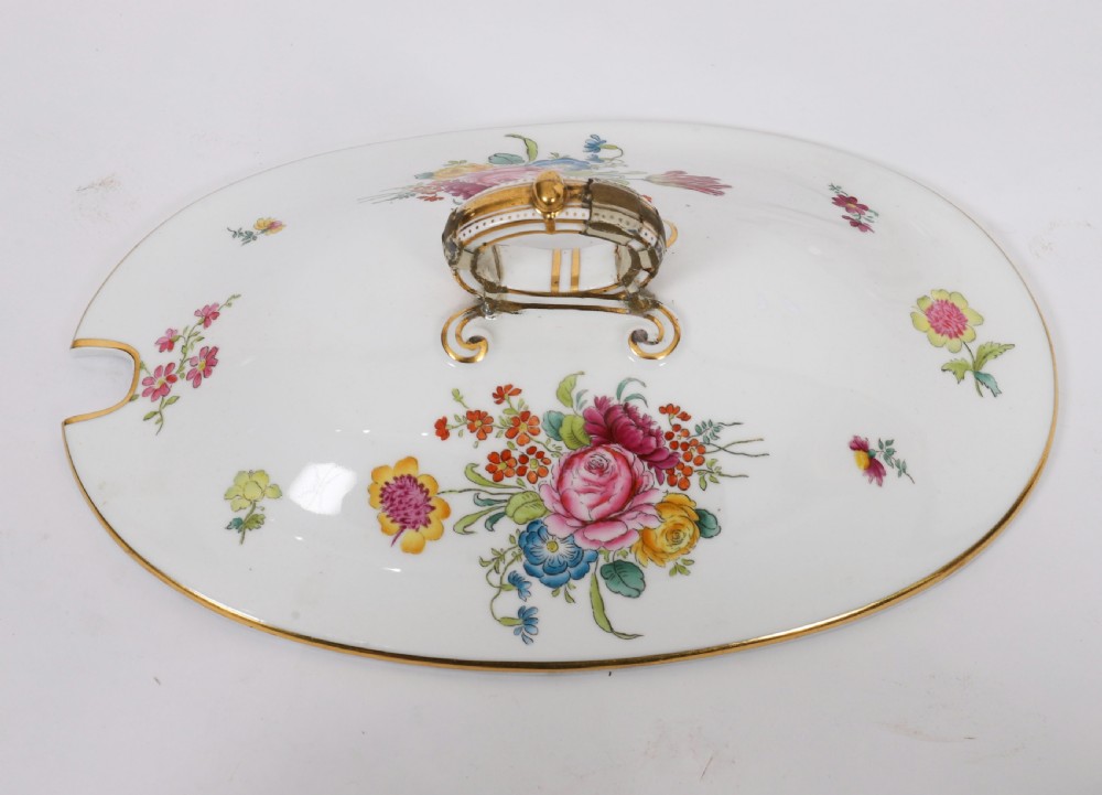 A 60-piece Victorian Copeland Spode white porcelain dinner service decorated with hand-painted floral bouquets, gilt rims, plates, crescent side dishes, and a covered tureen. View VII