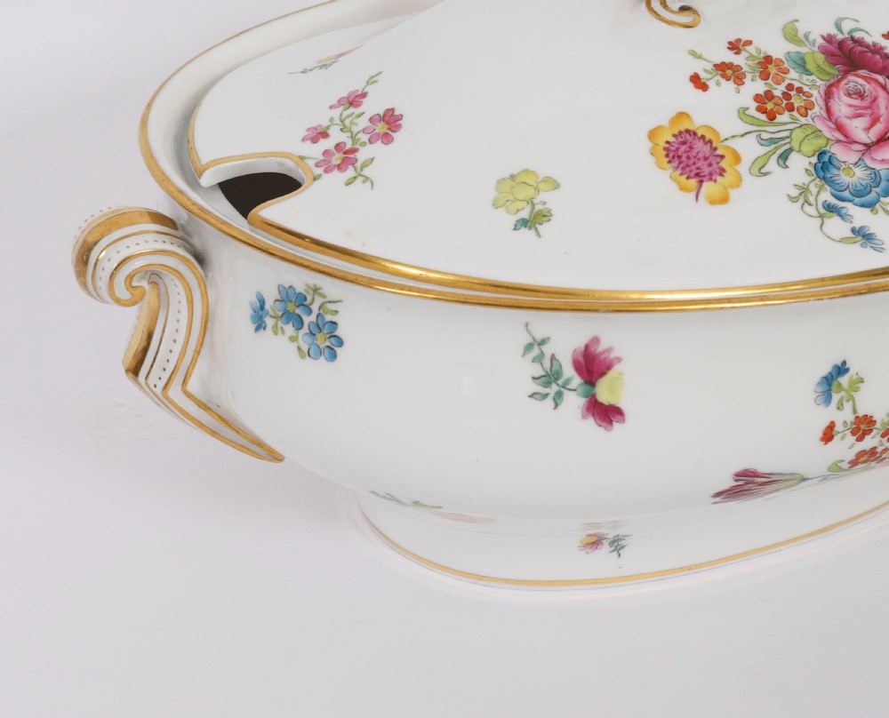 A 60-piece Victorian Copeland Spode white porcelain dinner service decorated with hand-painted floral bouquets, gilt rims, plates, crescent side dishes, and a covered tureen. View IX