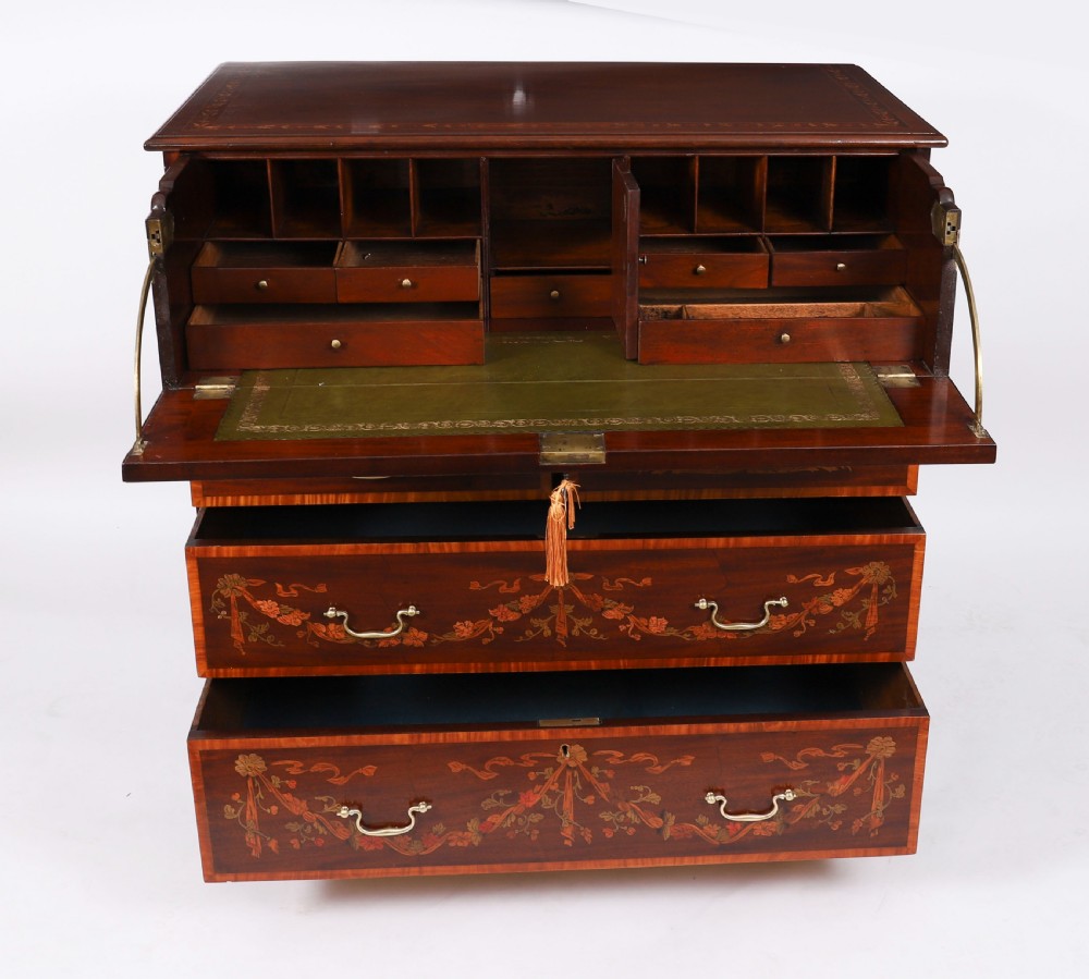 An eighteenth-century dark mahogany secretaire chest featuring intricate floral marquetry inlay on the drawer fronts, brass handles, and bracket feet. View IV