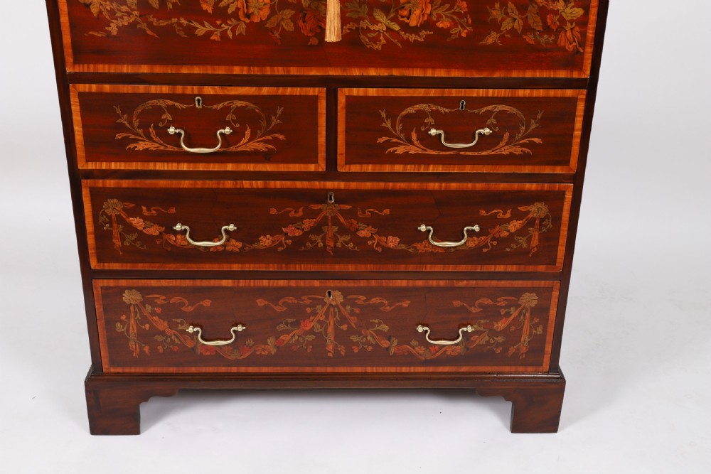 An eighteenth-century dark mahogany secretaire chest featuring intricate floral marquetry inlay on the drawer fronts, brass handles, and bracket feet. View VII