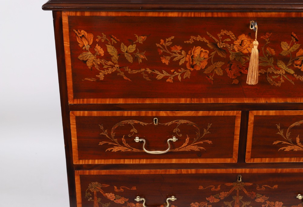 An eighteenth-century dark mahogany secretaire chest featuring intricate floral marquetry inlay on the drawer fronts, brass handles, and bracket feet. View VIII
