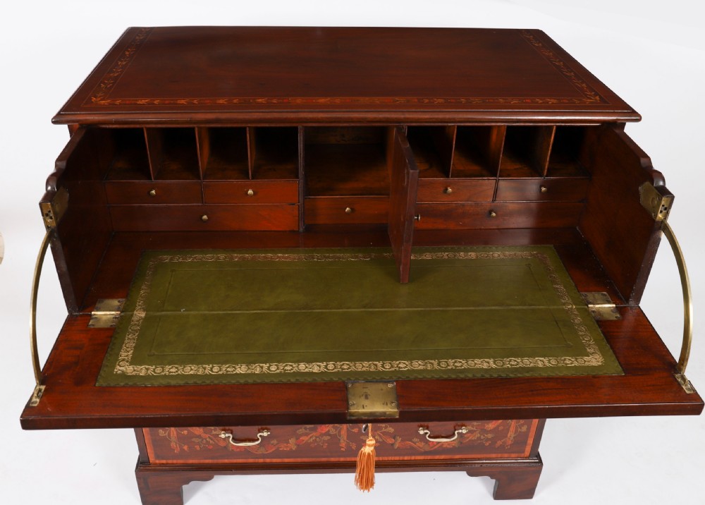 An eighteenth-century dark mahogany secretaire chest featuring intricate floral marquetry inlay on the drawer fronts, brass handles, and bracket feet. View XI