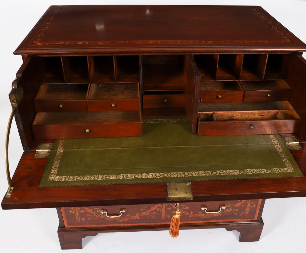 An eighteenth-century dark mahogany secretaire chest featuring intricate floral marquetry inlay on the drawer fronts, brass handles, and bracket feet. View XII