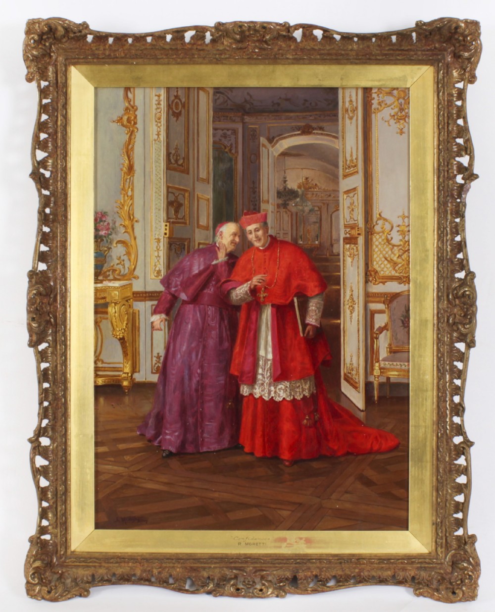 A 19th-century oil painting depicting two Catholic clergymen in red and purple robes conversing inside an ornate room, enclosed in a carved gilt frame.