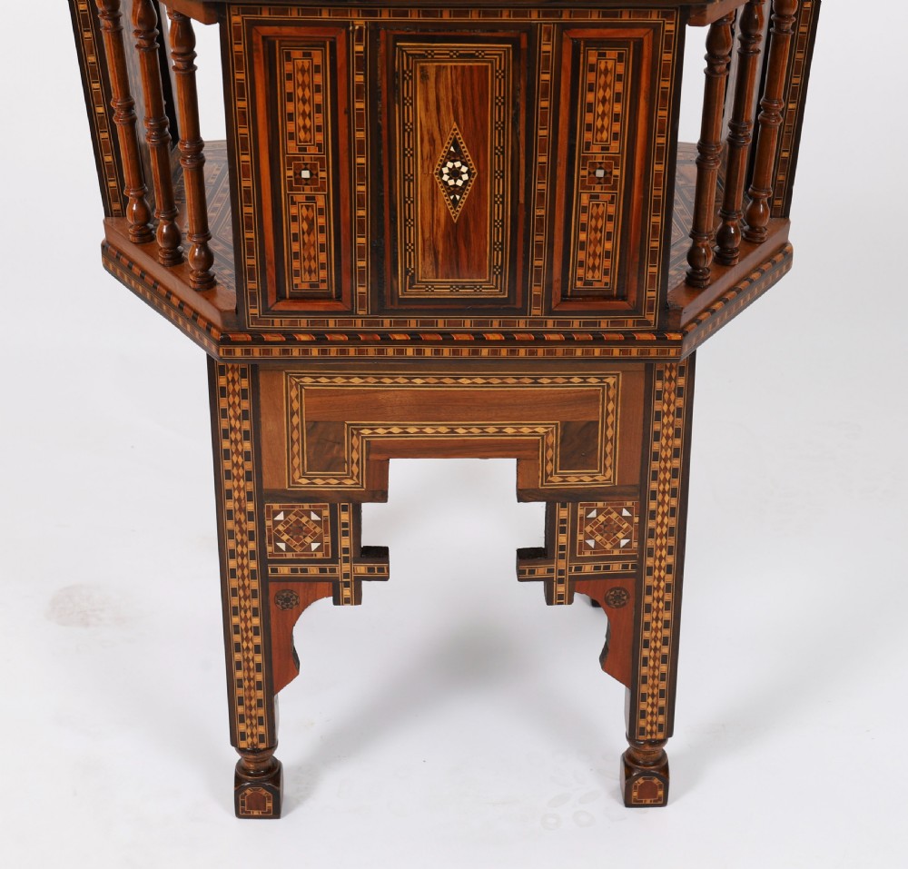 A pair of 19th-century Levantine armchairs decorated with geometric wood parquetry, mother-of-pearl inlay, turned side spindles, and stepped crest rails. View XII